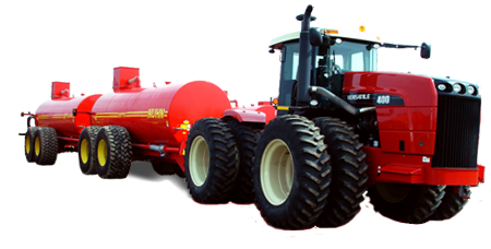 Versatile Tractor pulling Nuhn Liquid Manure Spreader Wagon
